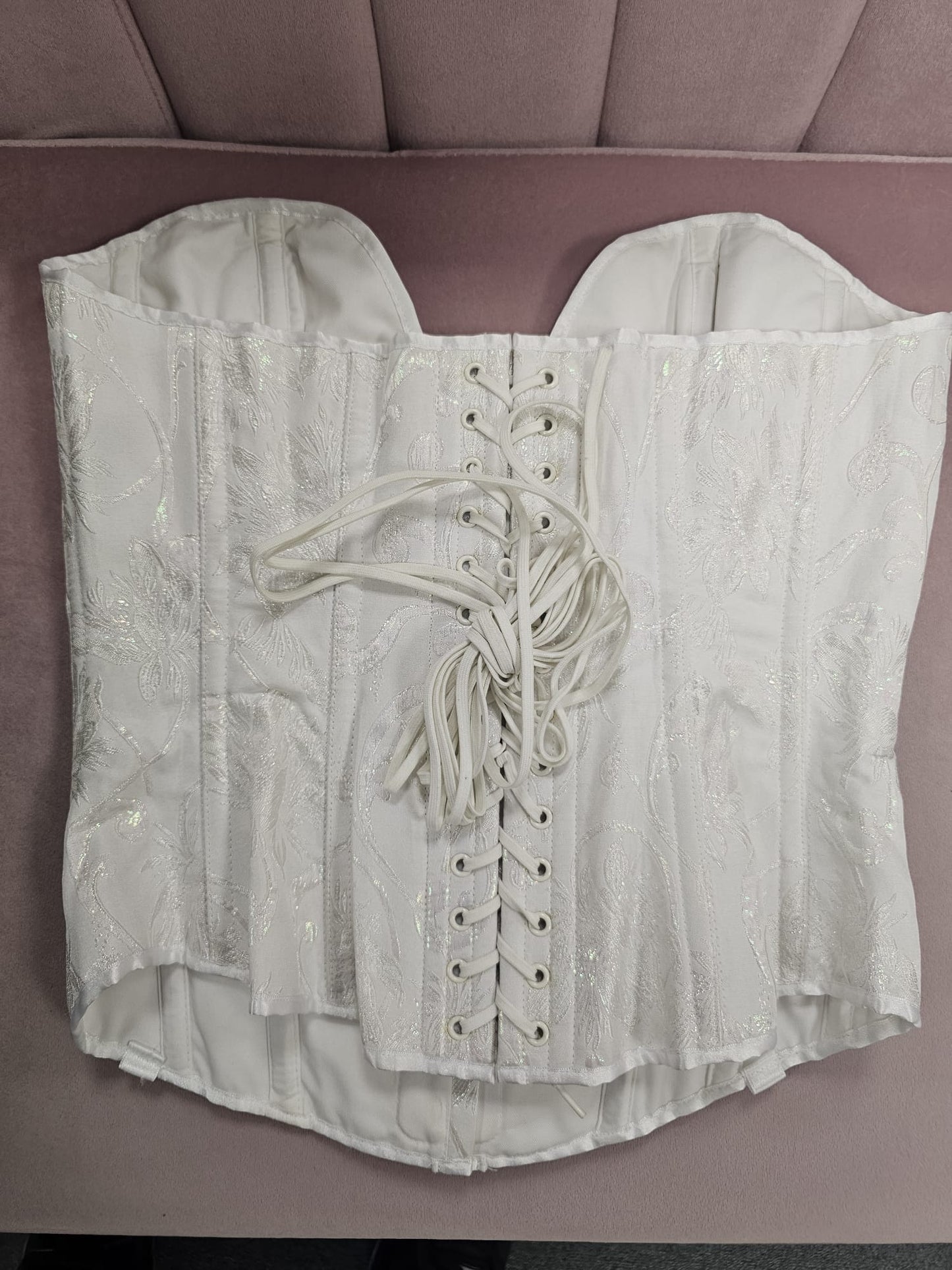 Back of Ivory with a pink shimmer brocade plunge corset