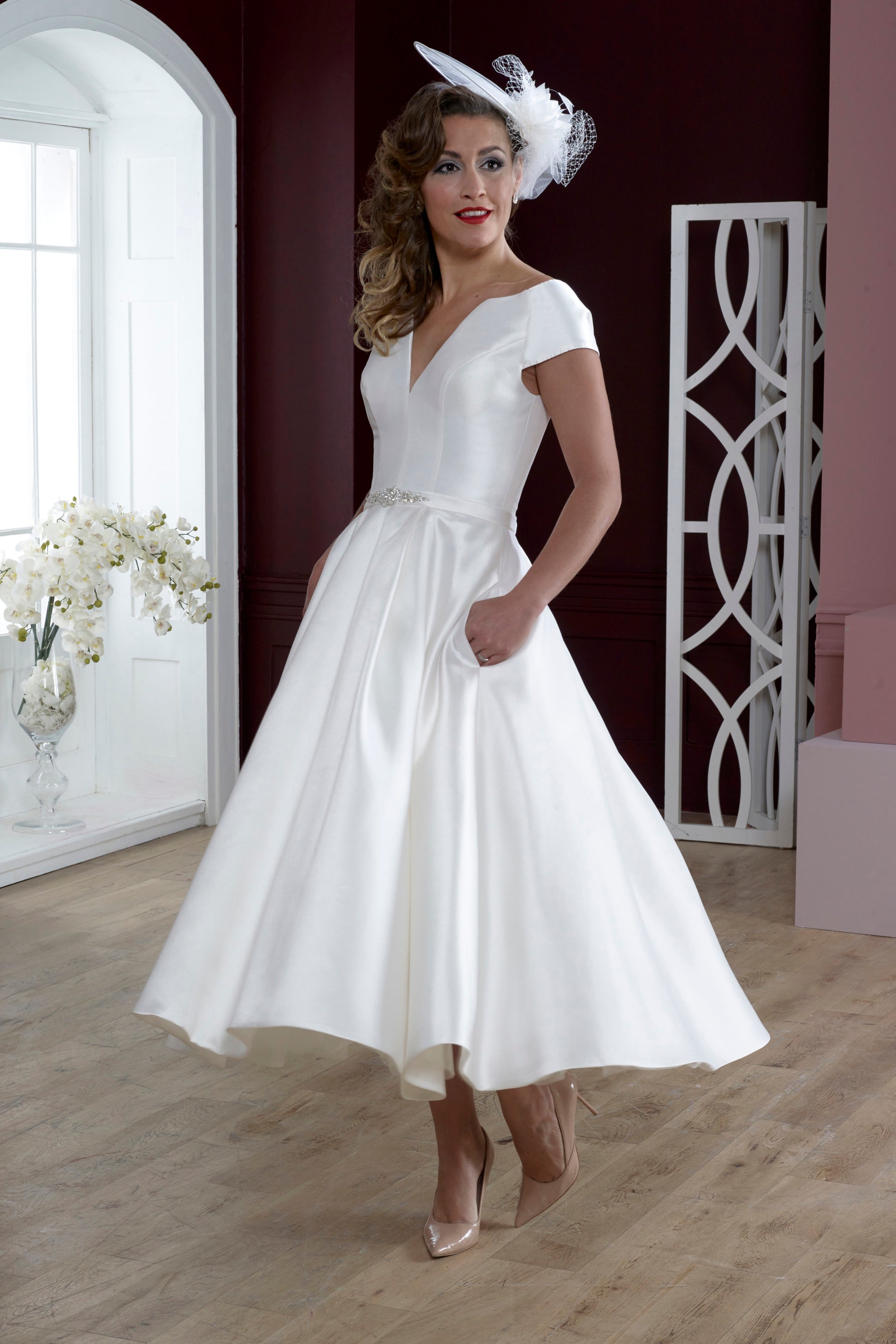 Side view of short tea length wedding dress in luxury mikado