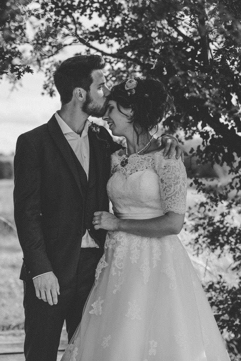 tb-gia-o Short tea length bridal gown with lace trimmed neckline