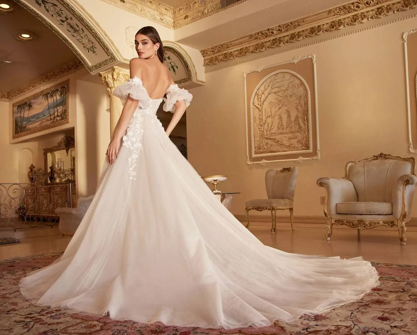 The back of the full length Mary ivory strapless wedding dress