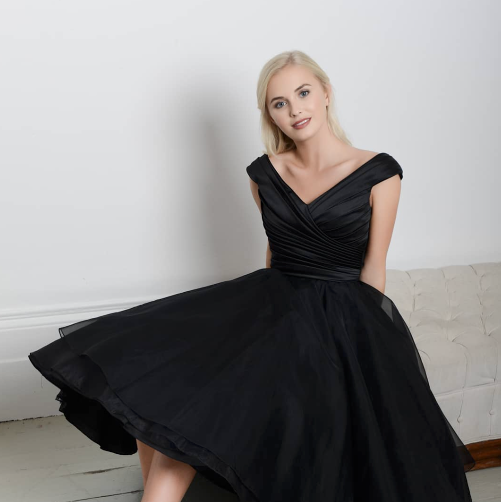 The black satin tea length Annette wedding dress