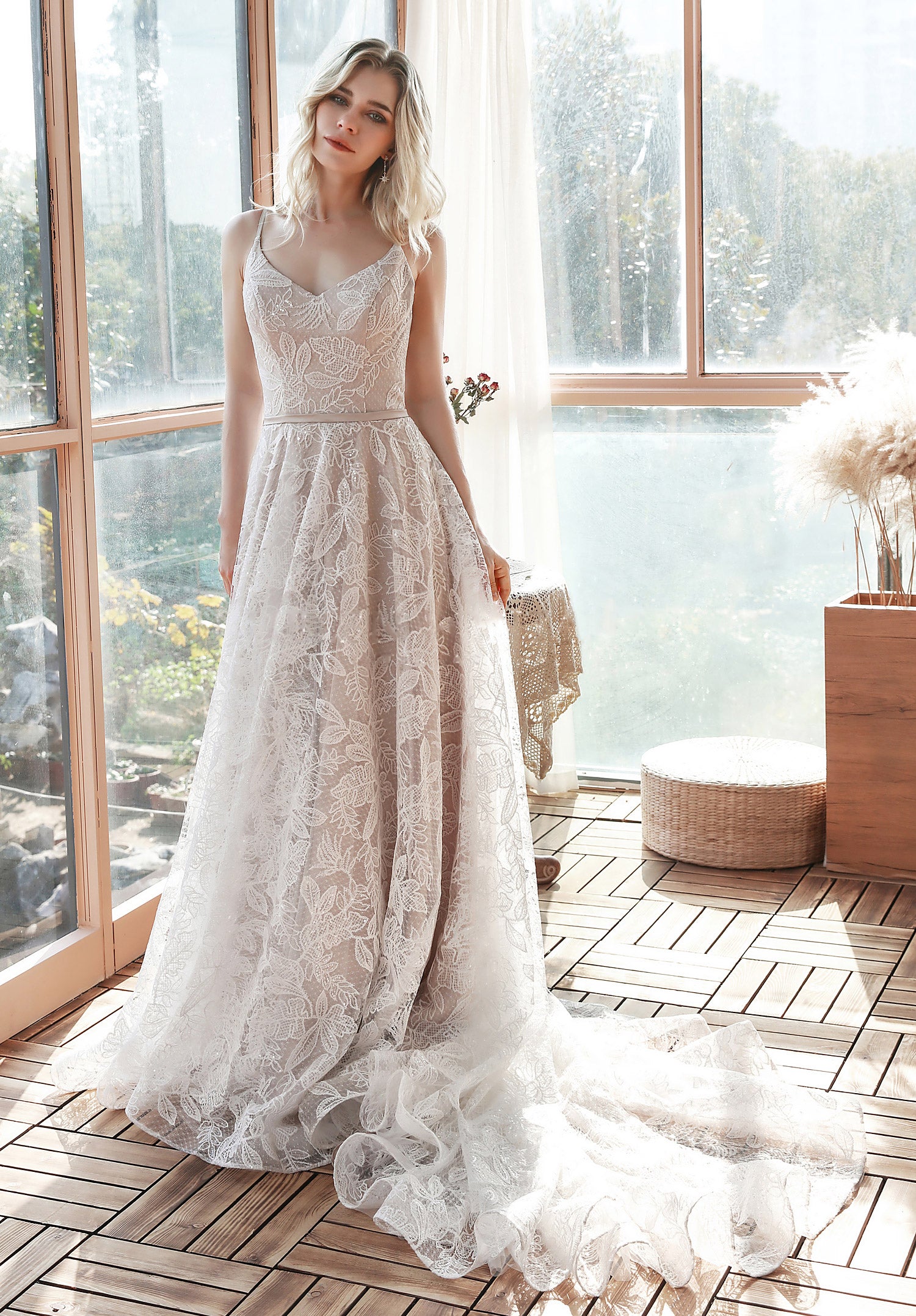 The Cara Boho wedding dress in ivory embroidered lace with delicate sequin.