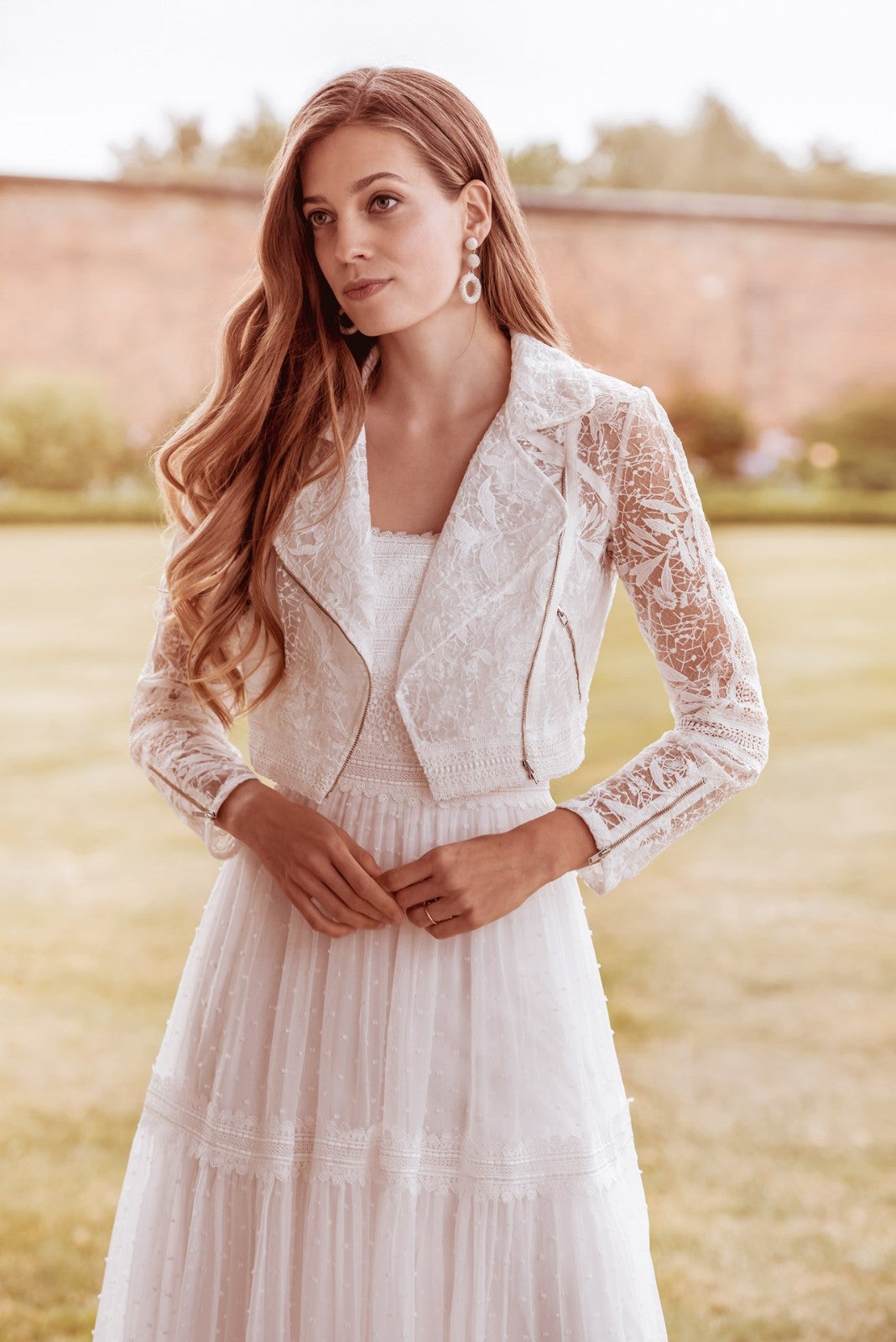 Ivory Lace biker jacket with zip details. High waisted. Works well with our Boho dresses and Fifties tea length styles