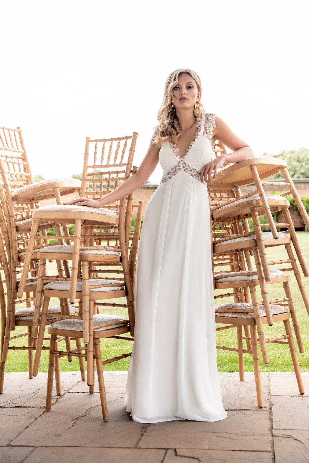 Ivory chiffon Empire line Dress with lace trim details at neckline & waist