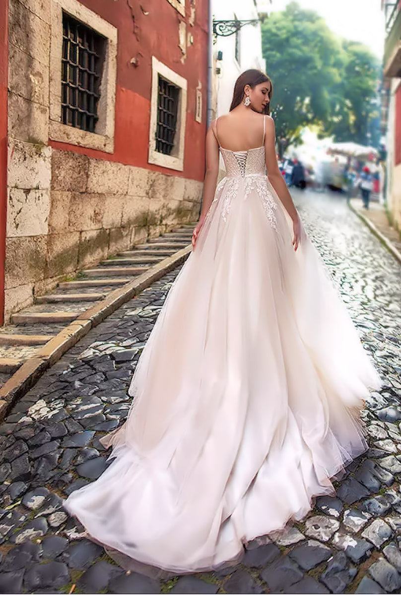 The train of the Amal Boho wedding dress