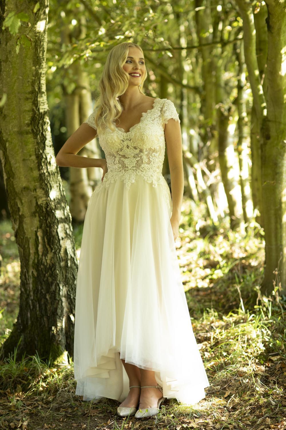 This is Marisa; a chic vintage-inspired lace bridal dress