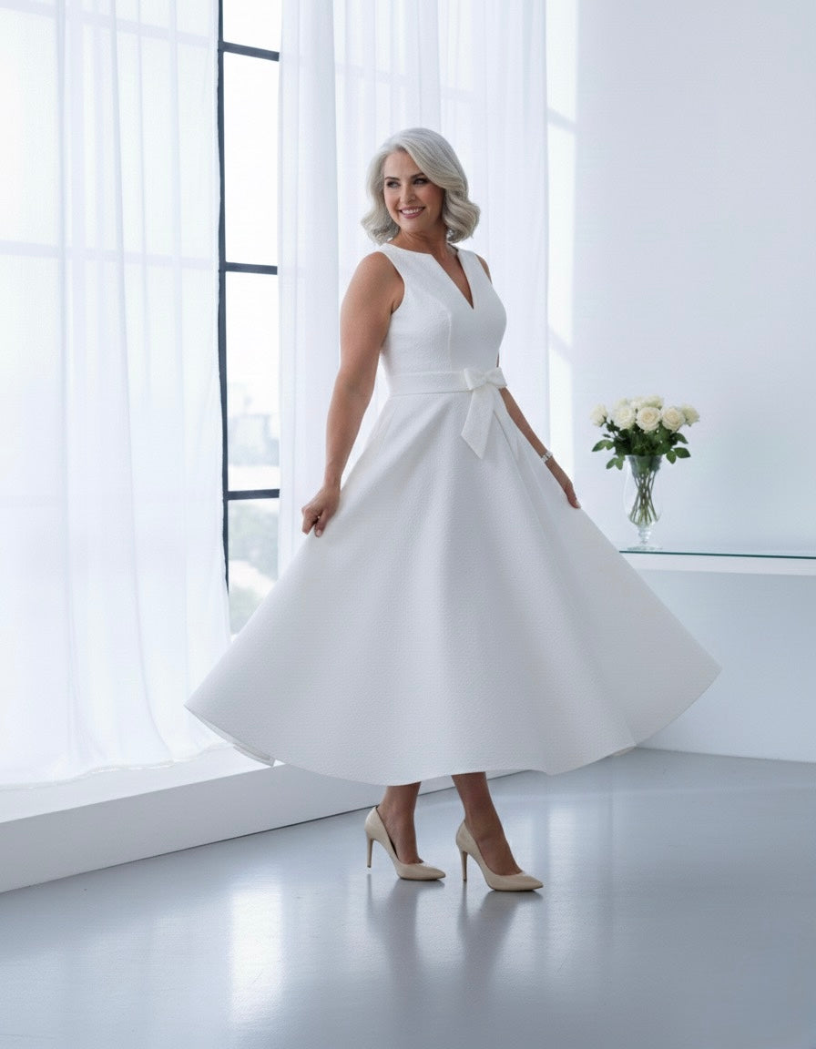 hn-veronica Brocade tea length wedding dress with subtle bow and elegant cut