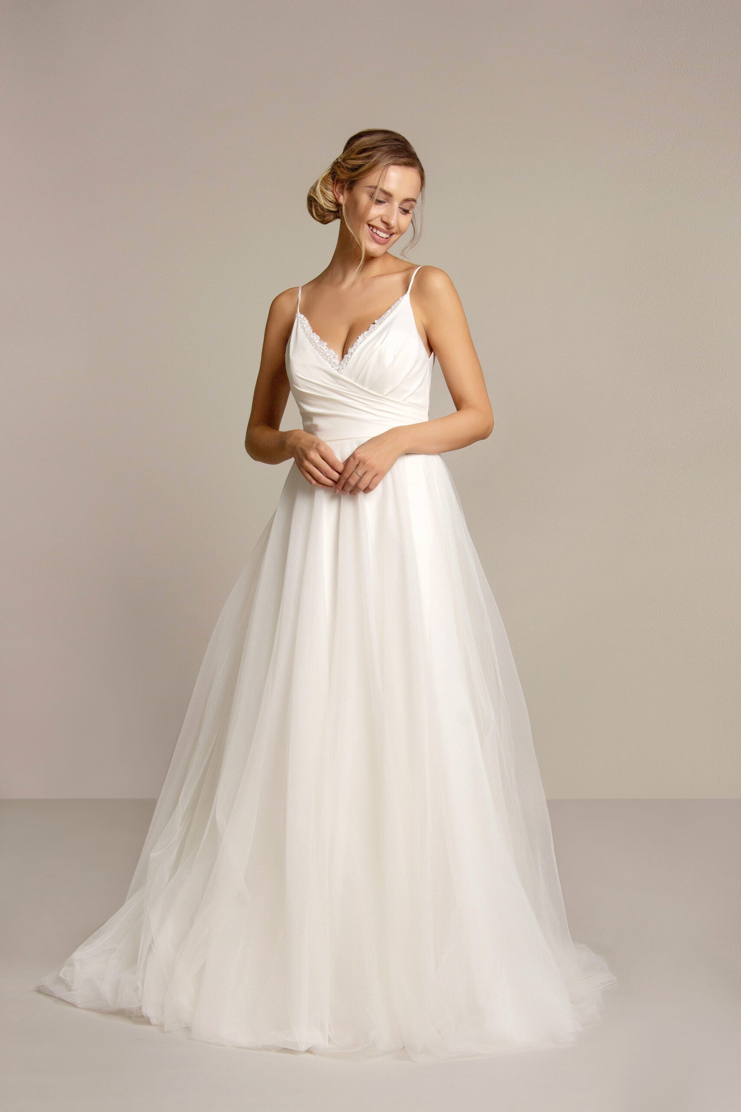 The front of the Moira chiffon and sequin tulle bridal gown