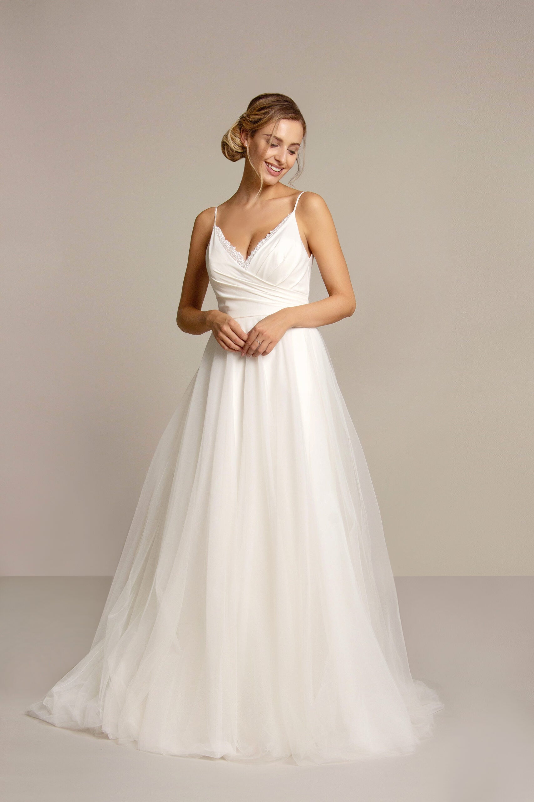 The front of the Moira chiffon and sequin tulle bridal gown