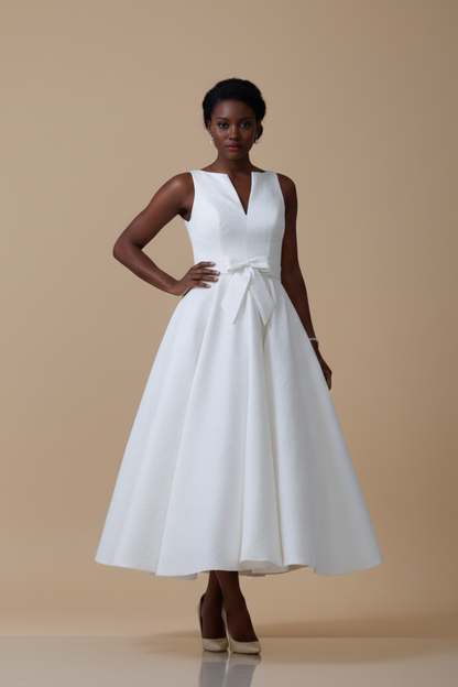 hn-veronica Brocade tea length wedding dress with subtle bow and elegant cut
