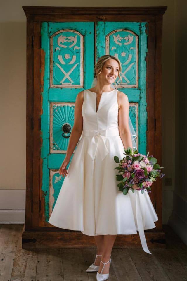 A bride wearing her House of Nicholas veronica wedding dress