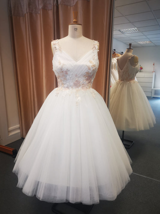 Delicate pleated bodice tulle bridal gown with coloured floral embroidery.