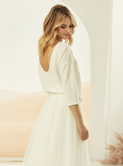 Close of back of Sarah Ivory super soft knitted top with low v back