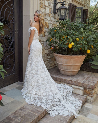 Back of Evelyn Boho style fit and flare wedding dress