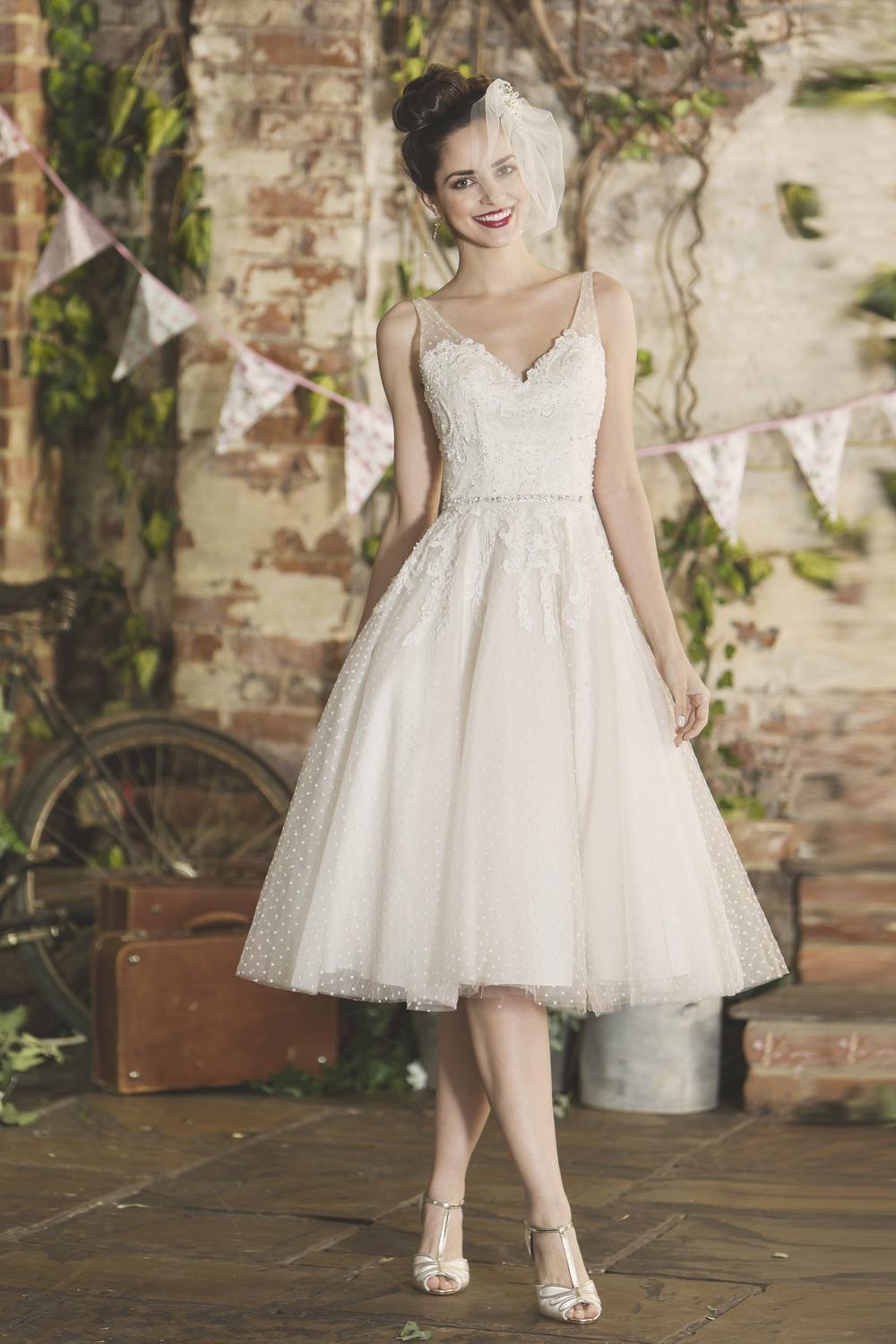 Sadie is a short tea length wedding dress with V neck