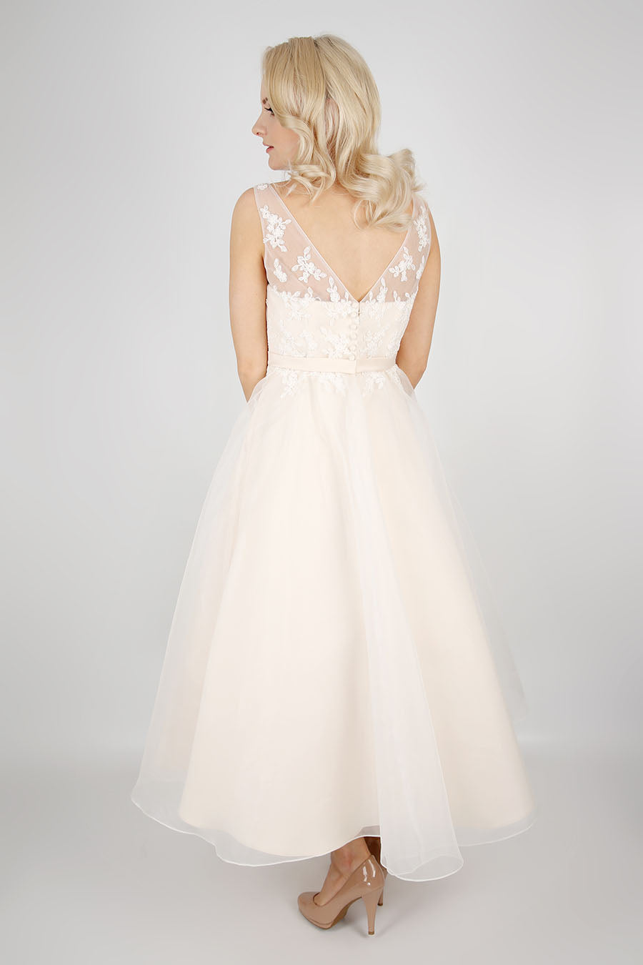 Back of the Luna tea length wedding dress in champagne
