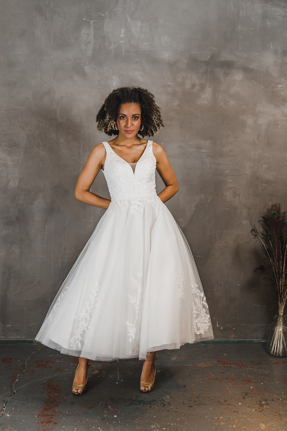 Tulle with lace appliqué tea length wedding gown
