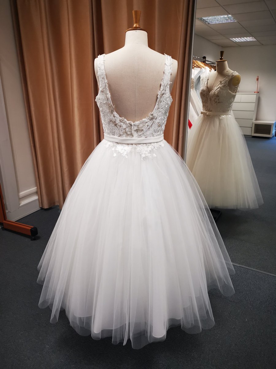 Back of floral embroidered bodice in Ivory and metallic tone, tulle skirt and detachable belt bridal gown