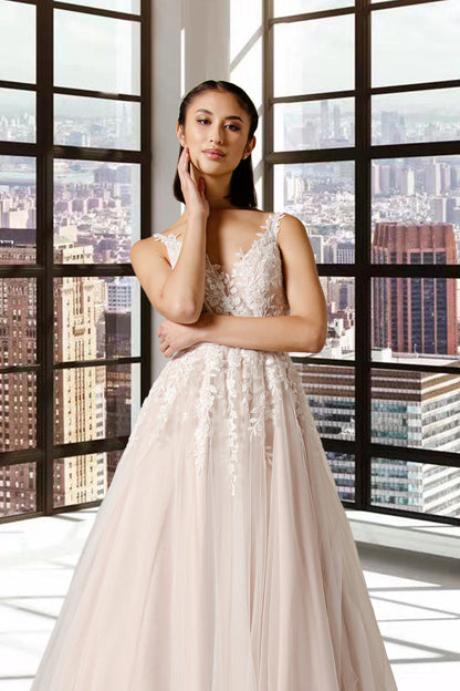 The Lyra tulle and lace, V neckline soft silhouette Boho bridal or ball gown with pretty lace over bodice that trails into the skirt.