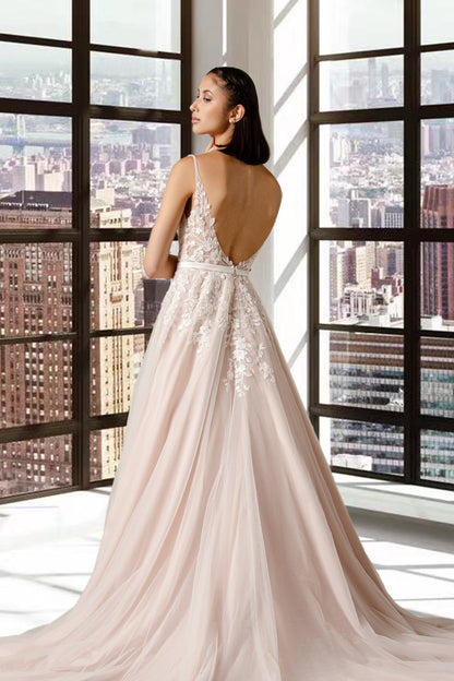The back of the Lyra tulle and lace, V neckline soft silhouette Boho bridal or ball gown with pretty lace over bodice that trails into the skirt.