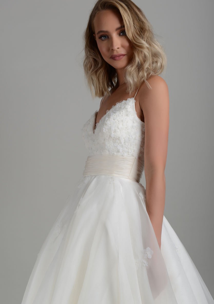 Close up of silk organza strappy tea length wedding dress