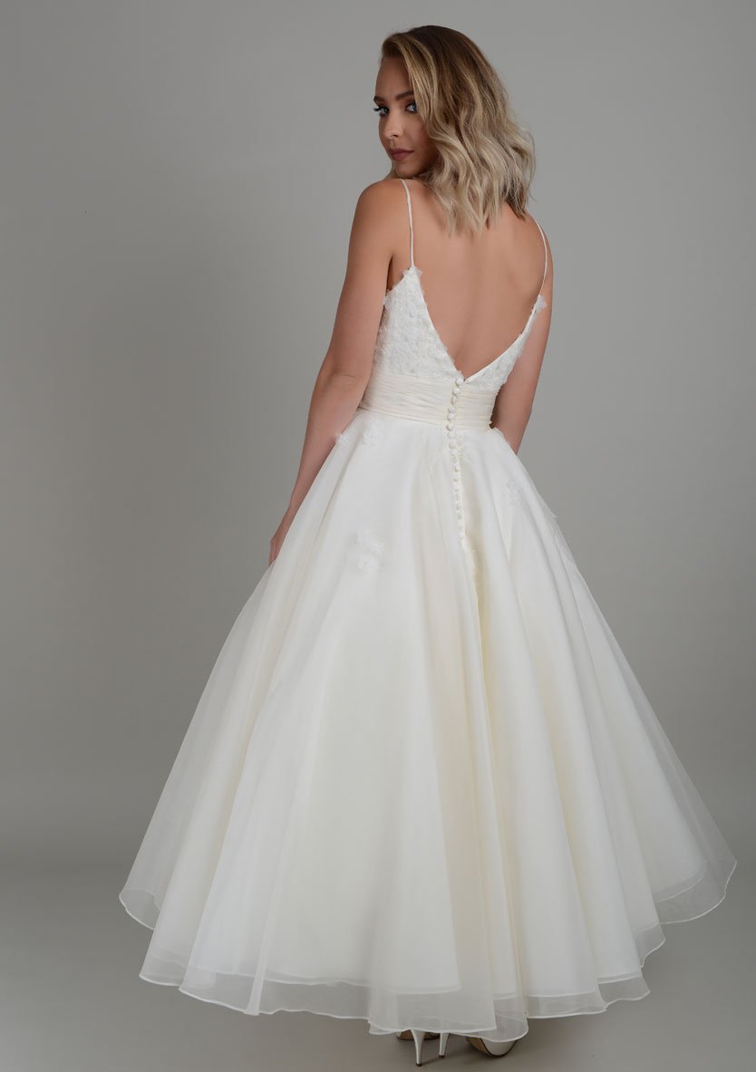 Back of silk organza strappy tea length wedding dress