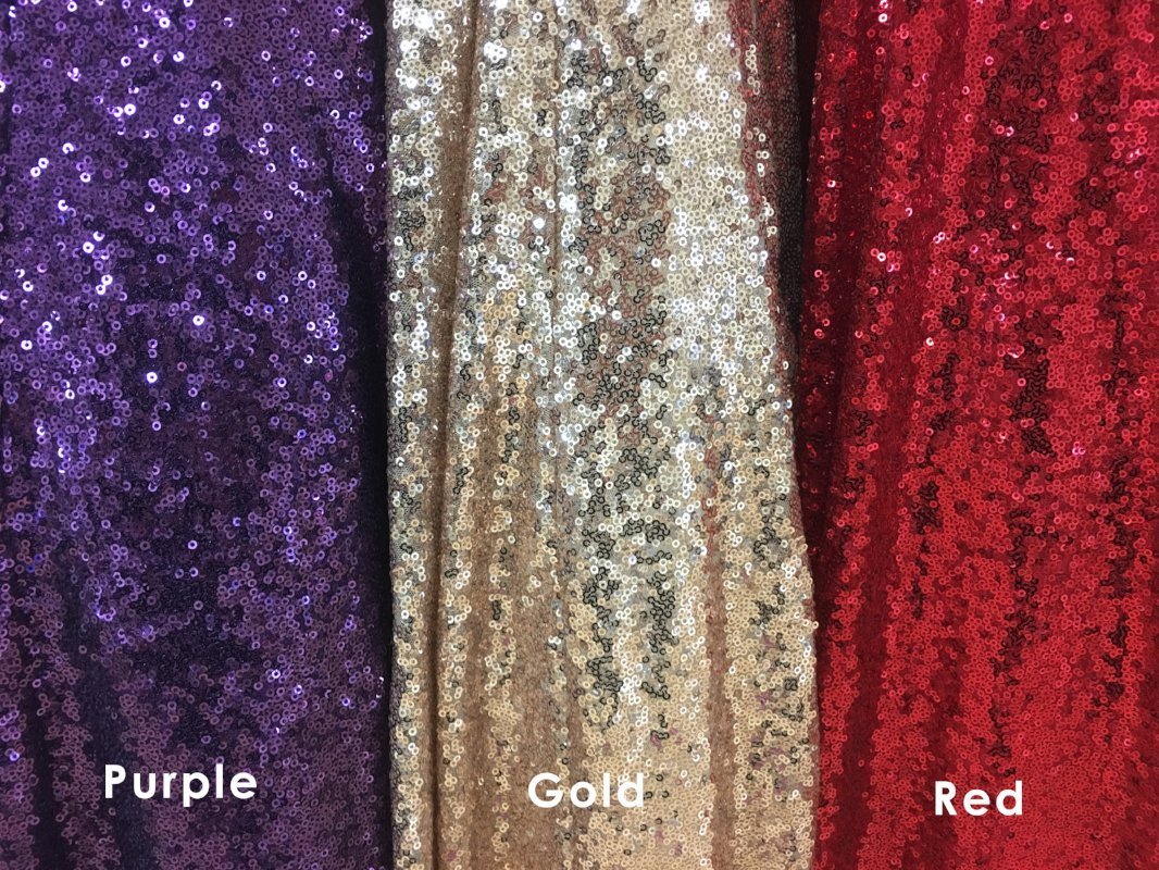 ab-nicole-r  Fifties length sequin gown with full skirt and cross over bodice.