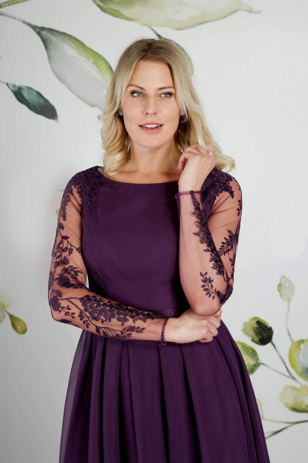 The bodice of tea length wedding dress in amethyst with high low hem and a fully pleated chiffon skirt | rd-linton