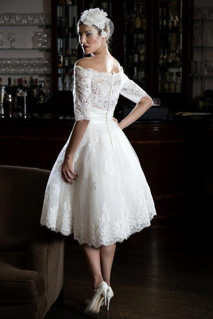 tb-gia-o Short tea length bridal gown with lace trimmed neckline