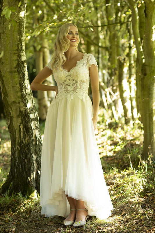 This is Marisa; a chic vintage-inspired lace bridal dress