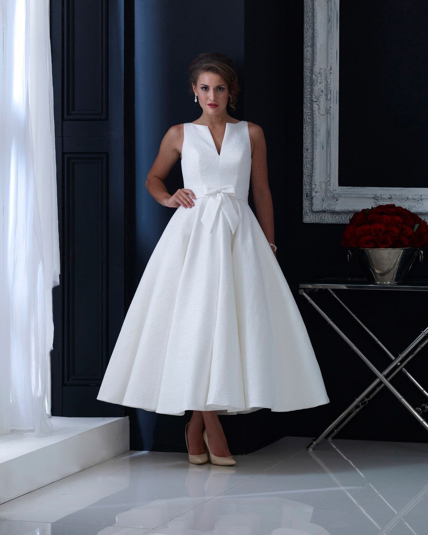 Brocade tea length wedding dress with subtle bow and elegant cut FairyGothMother Brocade tea length wedding dress with subtle bow and elegant cut FairyGothMother